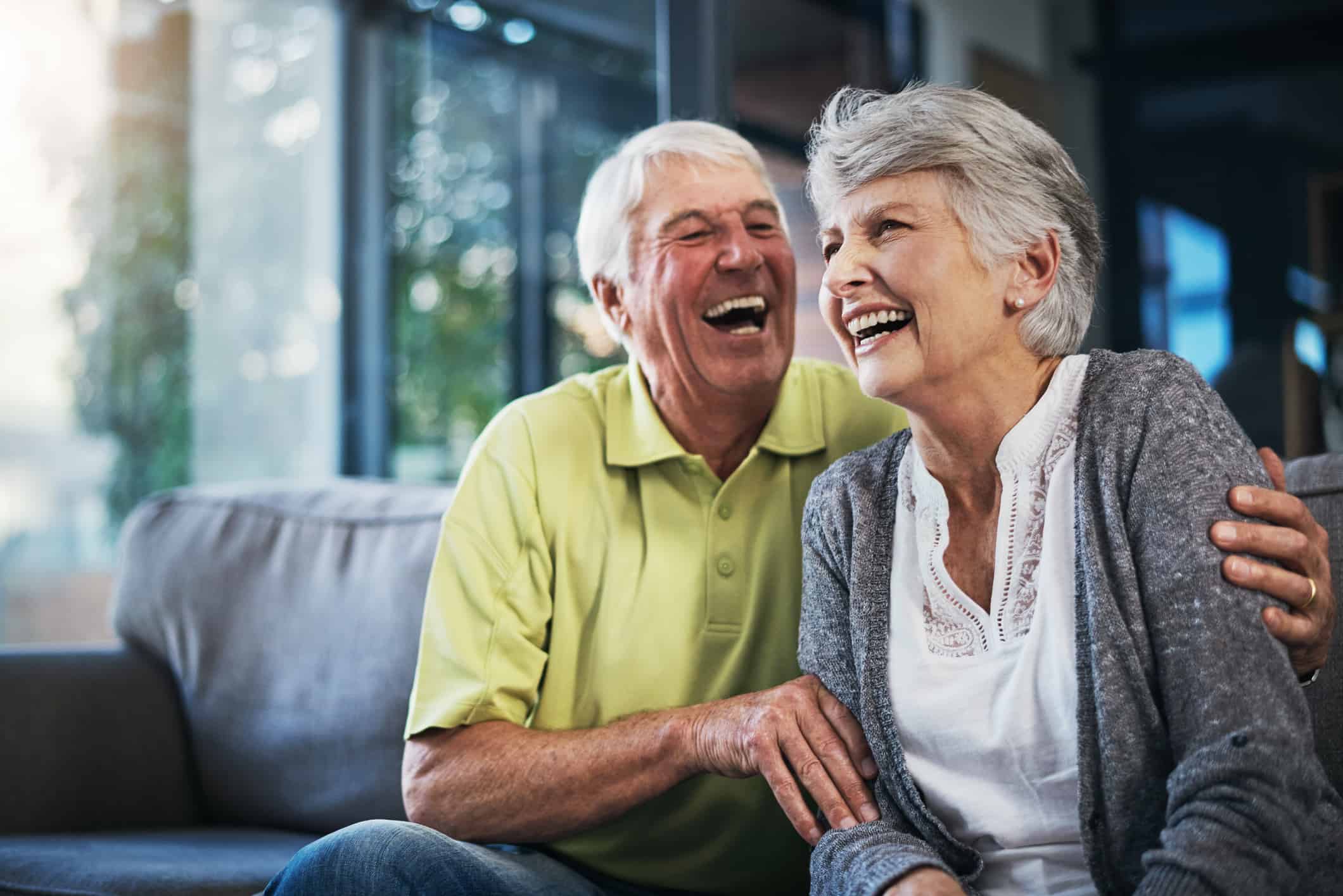 Shot of a happy senior couple relaxing together on the sofa at home
